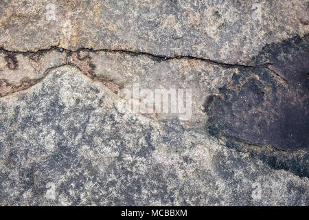 Stone texture. Surface of gritstone on Kinder Scout, Derbyshire, Peak District, England, UK Stock Photo