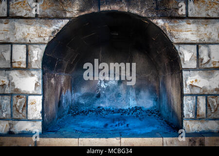 Closeup of outdoor traditional empty brick oven for cooking and baking. Stock Photo