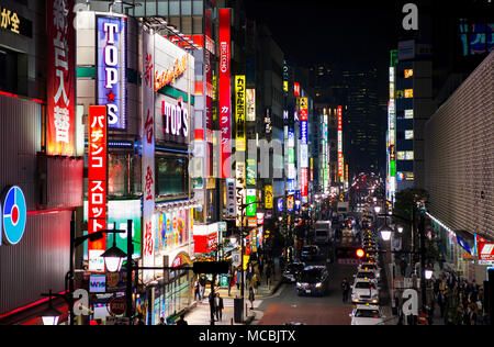 View into a street with illuminated advertising, shops, restaurants and bars, night view, Shimbashi, Tokyo, Japan Stock Photo
