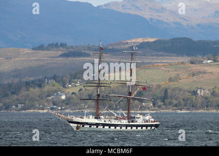 Stavros S Niarchos, a square-rigged vessel operated by the Tall Ships Youth Trust, passing Gourock on the Firth of Clyde, Scotland. Stock Photo