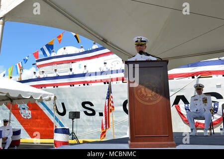 Coast Guard Capt. Steven Whittrock, Coast Guard Cutter Sherman’s commanding officer, addresses the audience during the Sherman’s decommissioning ceremony in Honolulu, Mar. 29, 2018. The Sherman’s nearly half-century long operation resume includes combat action in the Vietnam War, record-setting cocaine seizures and a number of fisheries, law enforcement and search and rescue cases from the Eastern Pacific to the Bering Sea. Stock Photo