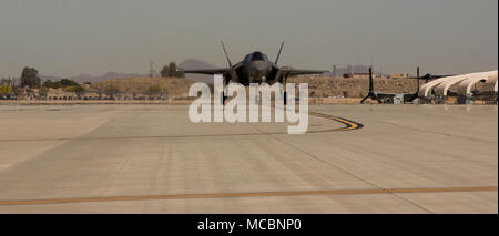 The Commanding Officer of Marine Fighter Attack Squadron 122 (VMFA-122), Lt. Col. John P. Price, lands after conducting the first flight operations in an F-35B Lightning ll at Marine Corps Air Station (MCAS) Yuma, Ariz., March 29, 2018. VMFA-122 conducted the flight operations for the first time as an F-35 squadron. Stock Photo