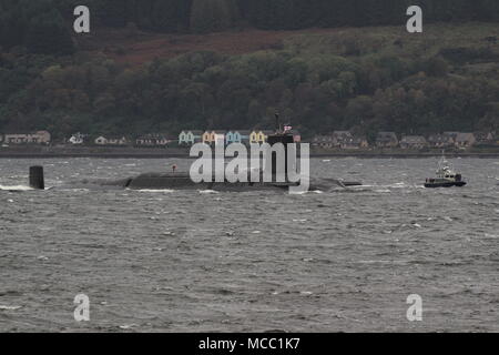 HMS Victorious (S29), a Vanguard-class submarine operated by the Royal Navy, passing Gourock on an inbound journey to the Faslane naval base. Stock Photo