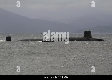 HMS Victorious (S29), a Vanguard-class submarine operated by the Royal Navy, passing Gourock on an inbound journey to the Faslane naval base. Stock Photo