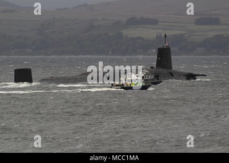 HMS Victorious (S29), a Vanguard-class submarine operated by the Royal Navy, passing Gourock on an inbound journey to the Faslane naval base. Stock Photo