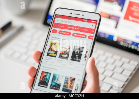 Melbourne, Australia - Feb 2, 2018: Browsing the movies and TV programmes in Google Play Store on a smartphone Stock Photo