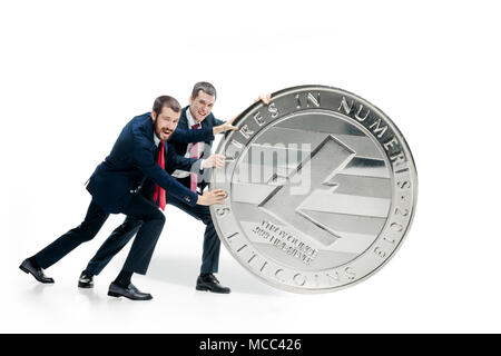Two business men holding business icon Stock Photo