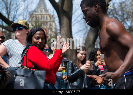 Appreciating the street performers near City Hall, New York City, April 2018. Stock Photo