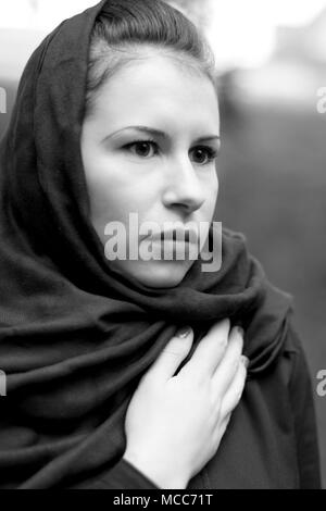 closeup portrait of inconsolable widow Stock Photo