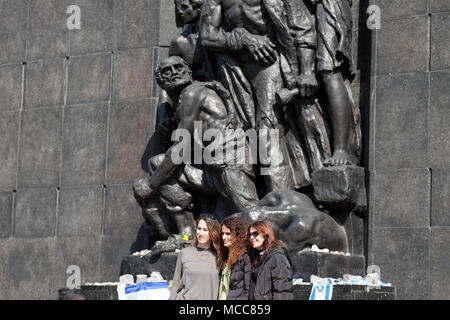 Warsaw Poland Visitors at the Monument to the Ghetto Heroes of the Warsaw Ghetto Uprising Stock Photo