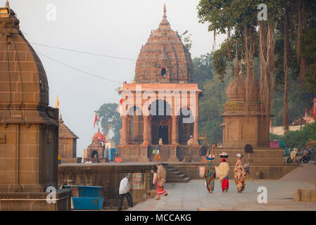 Unrecognizable Indian people walking in Hindu temple at Maheshwar, Madhya Pradesh, India. Stock Photo