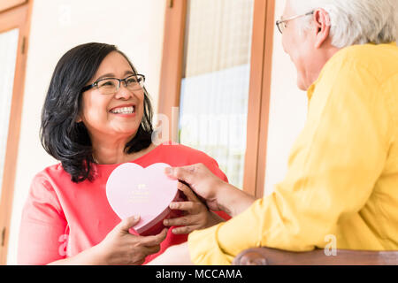 Asian senior couple in love smiling Stock Photo