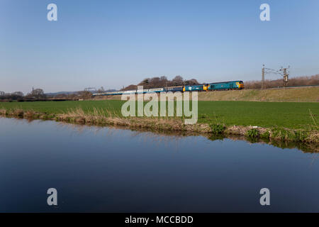 14/04/2018 Catterall (north of Preston, Lancaster canal in foreground) 50007 Hercules + 50049 Defiance 1Z52 1405 Carlisle - Birmingham international  Stock Photo