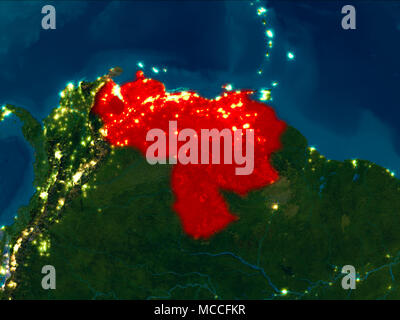 Satellite night view of Venezuela highlighted in red on planet Earth. 3D illustration. Elements of this image furnished by NASA. Stock Photo