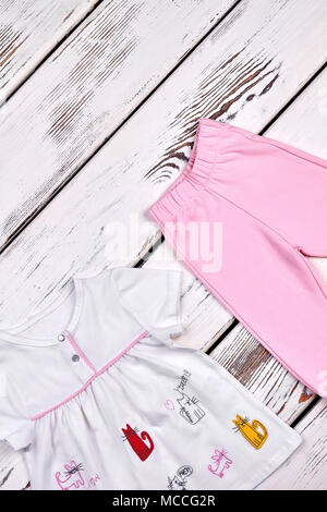 Little girl summer fashion background. Cute leggings and dress for little  girls. Kids summer fashion Stock Photo - Alamy