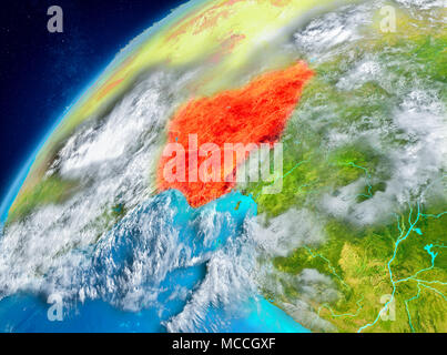 Country of Nigeria in red on planet Earth with atmosphere. 3D illustration. Elements of this image furnished by NASA. Stock Photo