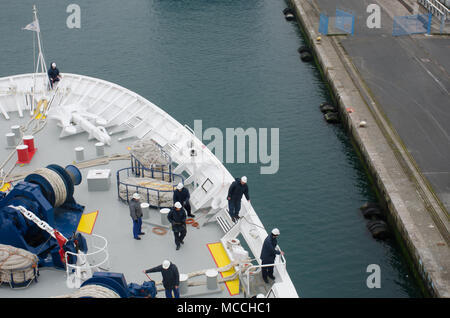 Cherbourg France 3 April 2018: Cruise ship being tied up Bow end Stock Photo