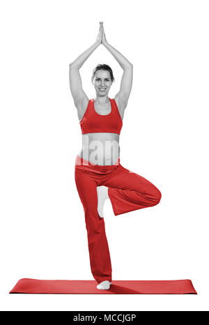 Pregnant woman making exercise, isolated on white Stock Photo