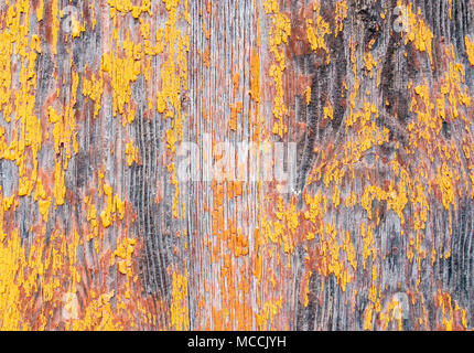 Flaking/peeling paint on old, weathered wooden door. Suitable fore textured background use... Stock Photo