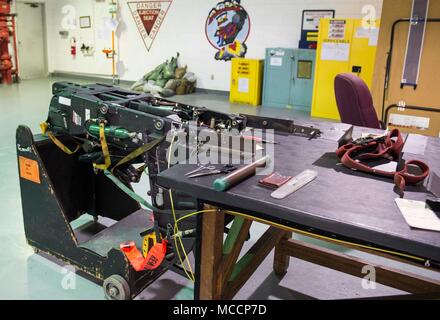 An F-15 Eagle ejection seat sits in the 18th Component Maintenance ...