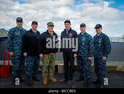 BANGOR, Wash. (Feb. 9, 2018) Deputy Secretary of Defense Patrick Shanahan stands in a group photo after a tour onboard the Ohio-class ballistic missile submarine USS Alabama (SSBN 731).  Shanahan also visited Submarine Development Squadron (DEVRON) 5, and Strategic Weapons Facility Pacific (SWFPAC) at Naval Base Kitsap-Bangor to see the operations of one leg of the nuclear triad. (U.S. Navy photo by Mass Communication Specialist 2nd Class Nancy C. diBenedetto/Released) Stock Photo