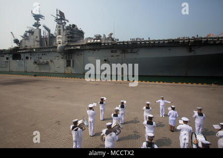 The USS Bonhomme Richard (LHD 6), arrives at Laem Chabang International Terminal, Thailand, Feb. 11, 2018. The Bonhomme Richard is a Wasp-class amphibious assault ship from Sasebo, Japan. While in port, the Bonhomme Richard will embark U.S. Marine and Navy personnel, vehicles and equipment before sailing alongside the Royal Thai Navy and Republic of Korea ships as part of Exercise Cobra Gold 18, an annual exercise conducted in the Kingdom of Thailand held from Feb. 13-23 with seven nations participating. (U.S. Marine Corps photo by Cpl. Joshua Pinkney) Stock Photo