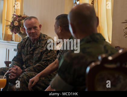 U.S. Marine Corps Lt. Gen. Lawrence Nicholson, left, commanding general, III Marine Expeditionary Force, talks with the Commandant of the Royal Thai Marine Corps, Vice Adm. Ratanah Vongsarojn, Feb. 14, 2018, at the Royal Thai Marine Command in Chonburi province, Thailand. Nicholson visited the Royal Thai Marine Command where he visited with the Royal Thai Marine Corps leadership and watched training demonstrations by Royal Thai Marine Corps recruits during exercise Cobra Gold 2018. The visit was conducted to increase teamwork, strengthen bonds and bolster interoperability to achieve effective  Stock Photo