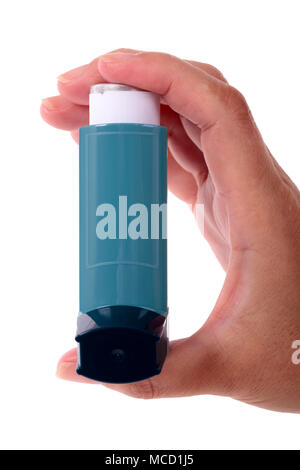 Hand holding asthma inhaler isolated on white background, vertical Stock Photo
