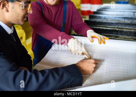 Making Necessary Corrections in Blueprint Stock Photo
