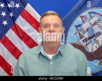 180215-N-XX082-002  VIRGINIA BEACH, Va. (Feb. 15, 2018) Edward Omientanski, course supervisor for the Journeyman Communications Course at Information Warfare Training Command Virginia Beach, was selected as the Center for Information Warfare Training's Civilian Instructor of the Year for 2017. (U.S. Navy photo by Lt. Rita Johnson/Released) Stock Photo