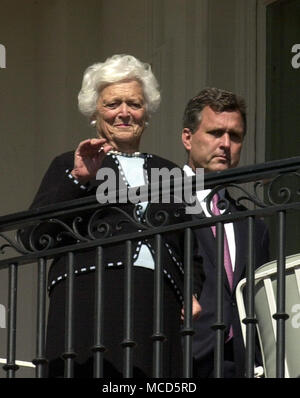 Washington, DC - November 2, 2005 -- Former first lady Barbara Bush waves to her son, United States President George W. Bush, prior to the arrival of Charles, the Prince of Wales and Camilla, the Duchess of Cornwall to the White House for a luncheon in Washington, DC on November 2, 2005. Marvin P. Bush, the President's brother, looks on.Credit: Ron Sachs/CNP.(Restriction: No New York Metro or other Newspapers within a 75 mile radius of New York City)/ MediaPunch Stock Photo