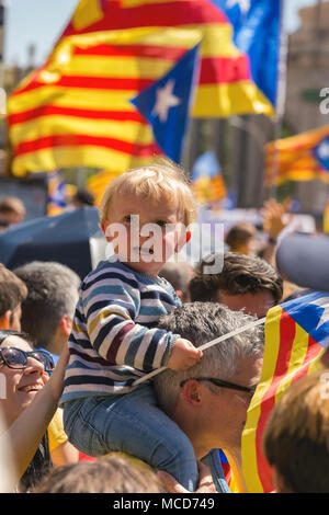 Barcelona, Spain. 15th April 2018. Catalan demonstrators with national catalan symbols in Barcelona to support the freedom of the political prisoners.More than 300.000 people have participated in the demonstration. 04. 15. 2018 Spain, Barcelona Credit: Arpad Radoczy/Alamy Live News Stock Photo