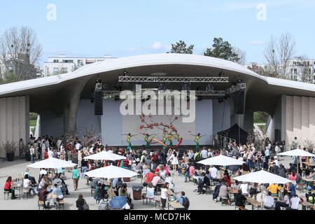 Berlin. 15th Apr, 2018. Photo taken on April 15, 2018 shows a view of performance of the Cherry Blossom Festival at the Gardens of the World in eastern Berlin, Germany. Around 25,000 visitors are expected to participate in the 12th Cherry Blossom Festival. Credit: Shan Yuqi/Xinhua/Alamy Live News Stock Photo