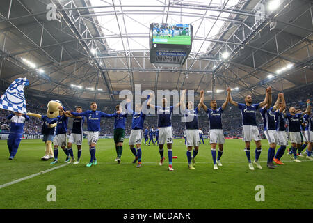 Gelsenkirchen, Germany. 15th Apr, 2018. Players of FC Schalke 04 celebrate after winning the Bundesliga match between FC Schalke 04 and Borussia Dortmund in Gelsenkirchen, Germany, on April 15, 2018. Credit: Joachim Bywaletz/Xinhua/Alamy Live News Stock Photo