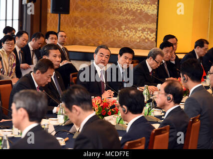 Tokyo, Japan. 16th Apr, 2018. Chinese State Councilor and Foreign Minister Wang Yi attends the high-level economic dialogue between China and Japan in Tokyo, Japan, on April 16, 2018. Wang Yi on Monday co-chaired the fourth high-level economic dialogue between China and Japan with Japanese Foreign Minister Taro Kono here. Credit: Ma Ping/Xinhua/Alamy Live News Stock Photo