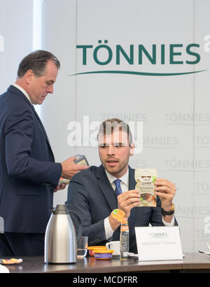 16 April 2018, Germany, Rheda-Wiedenbrueck:, Clemens Toennies (L) and Maximilian Toennies of Toennies Holding ApS & Co. KG., present the group's results for 2017. Photo: Friso Gentsch/dpa Stock Photo