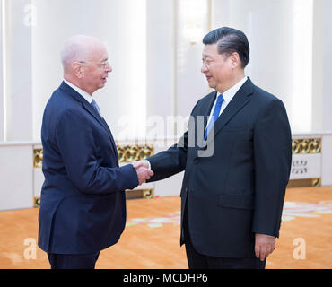 (180416) -- BEIJING, April 16, 2018 (Xinhua) -- Chinese President Xi Jinping (R) meets with Klaus Schwab, founder and executive chairman of the World Economic Forum (WEF), in Beijing, capital of China, April 16, 2018.  (Xinhua/Li Tao) (zwx) Stock Photo