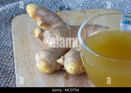ginger on wooden and ginger tea Stock Photo