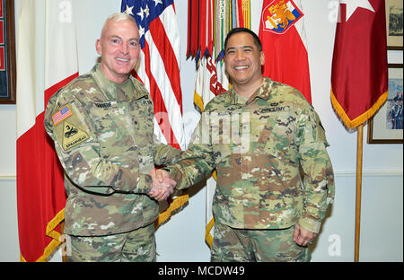 From left, Brig. Gen. Eugene J. LeBoeuf, acting Commander of U.S. Army Africa, and Brig. Gen. Antonio A. Aguto, Commanding General, 7th Army Training Command; pose for a photograph in the USARAF commander's office during a recent visit to Caserma Ederle, Vicenza, Italy Feb. 26, 2018. (Photo by U.S. Army Davide Dalla Massara) Stock Photo