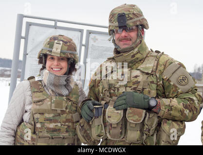 Yavoriv, Ukraine – U.S. Representative Elise Stefanik (R-NY) poses for a photo with Capt. Joshua Gioeli, the Joint Multinational Training Group –Ukraine Golf Company commander during a visit to the Yavoriv Combat Training Center (CTC) here Feb. 23. During the visit Stefanik met with U. S. service members stationed at the CTC and observed training conducted by 27th Infantry Brigade Combat Team Soldiers in the field. (U.S. Army photo by Sgt. Alexander Rector) Stock Photo