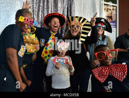 180225-N-ZC358-067  EL CENTRO, Calif. (Feb. 25, 2018) Blue Angel team members pose in a photo booth with fans at El Centro Regional Medical Hospital during a meet and greet event. The Blue Angels are scheduled to perform more than 60 demonstrations at more than 30 locations across the U.S. in 2018. (U.S. Navy photo by Mass Communication Specialist 2nd Class Jess Gray/Released) Stock Photo