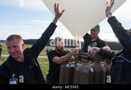 Team Hanscom prepared a helium-filled weather balloon on Feb. 27, 2018, for the 2017 Air Force Research Laboratory Commander’s Challenge at Redstone Arsenal in Huntsville, Alabama. The archival image records participating teams from Wright-Patterson, Eglin, and Kirtland Air Force Bases collaborating to develop resupply solutions for isolated troops. Stock Photo