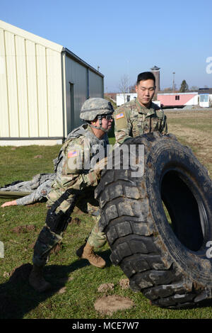 U.S. Army Spc. Jacqueline Delgado, assigned to U.S. Army Garrison Benelux, trains during the Best Warrior Competition, in Chièvres Air Base, Belgium, Feb.22, 2018. (U.S. Army photo by Visual Information Specialist Pascal Demeuldre) Stock Photo