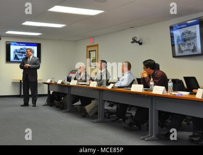 Naval Surface Warfare Center, Port Hueneme Division (NSWC PHD), Deputy Technical Director, Vance Brahosky, describes NSWC PHD’s history and capabilities during a collaboration meeting with California State University, Channel Islands representatives and NSWC PHD department managers and specialists, Feb. 28. Stock Photo