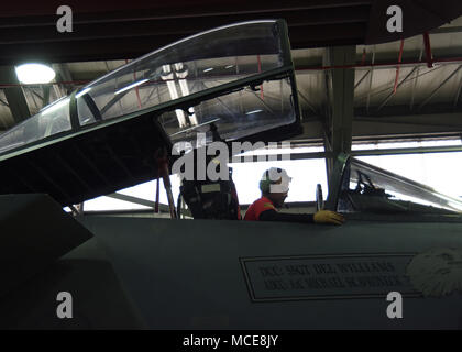 F-15C Eagle is powered by two Pratt and Whitney F100 turbofan engines and has a wingspan of 42 feet 9 inches. An archival image documents a satellite communication operational check being performed on the aircraft at Royal Air Force Lakenheath, England, supporting the 48th Fighter Wing mission. The historical photographic print records depot-level maintenance activity on a combat aircraft. Stock Photo