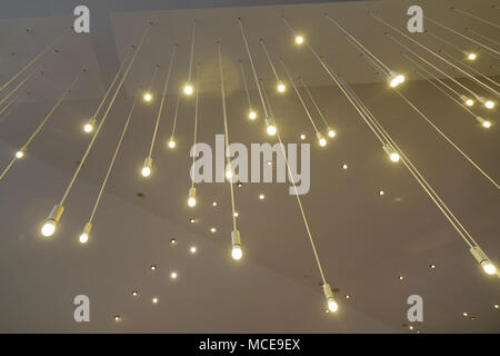 Hanging lights on ceiling. Interior concept for modern buildings. Stock Photo