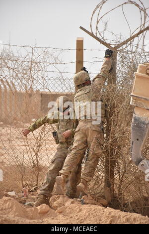 The archival image documents Army Reserve engineers leveling and ...
