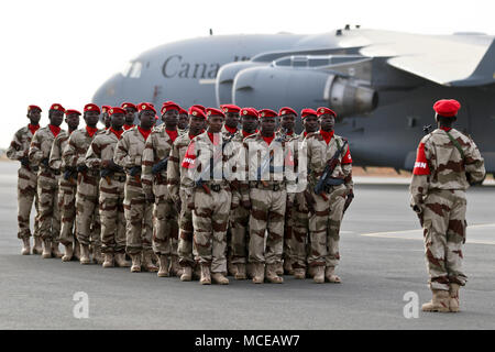 NIAMEY, Niger – Nigerian troops stand in formation prior to the start of the opening ceremony of Flintlock 2018 in Niamey, Niger, April 11, 2018. Flintlock is an annual, African-led, integrated military and law enforcement exercise that has strengthened key partner nation forces throughout North and West Africa as well as western Special Operations Forces since 2005. (U.S. Army Photo by Sgt. Heather Doppke/79th Theater Sustainment Command)