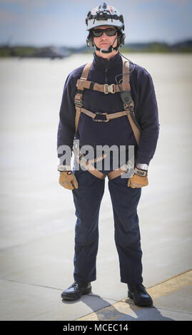 Jonathan Hirsch, a logistics specialist with New Jersey Task Force One, stands for a portrait before joint training on Joint Base McGuire-Dix-Lakehurst, N.J., April 11, 2018. The New Jersey National Guard trained with New Jersey Task Force One, an urban search and rescue unit. (U.S. Air National Guard photo illustration by Master Sgt. Matt Hecht) Stock Photo