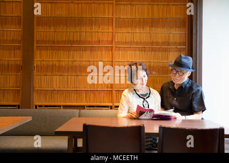 Senior couple reading books Stock Photo